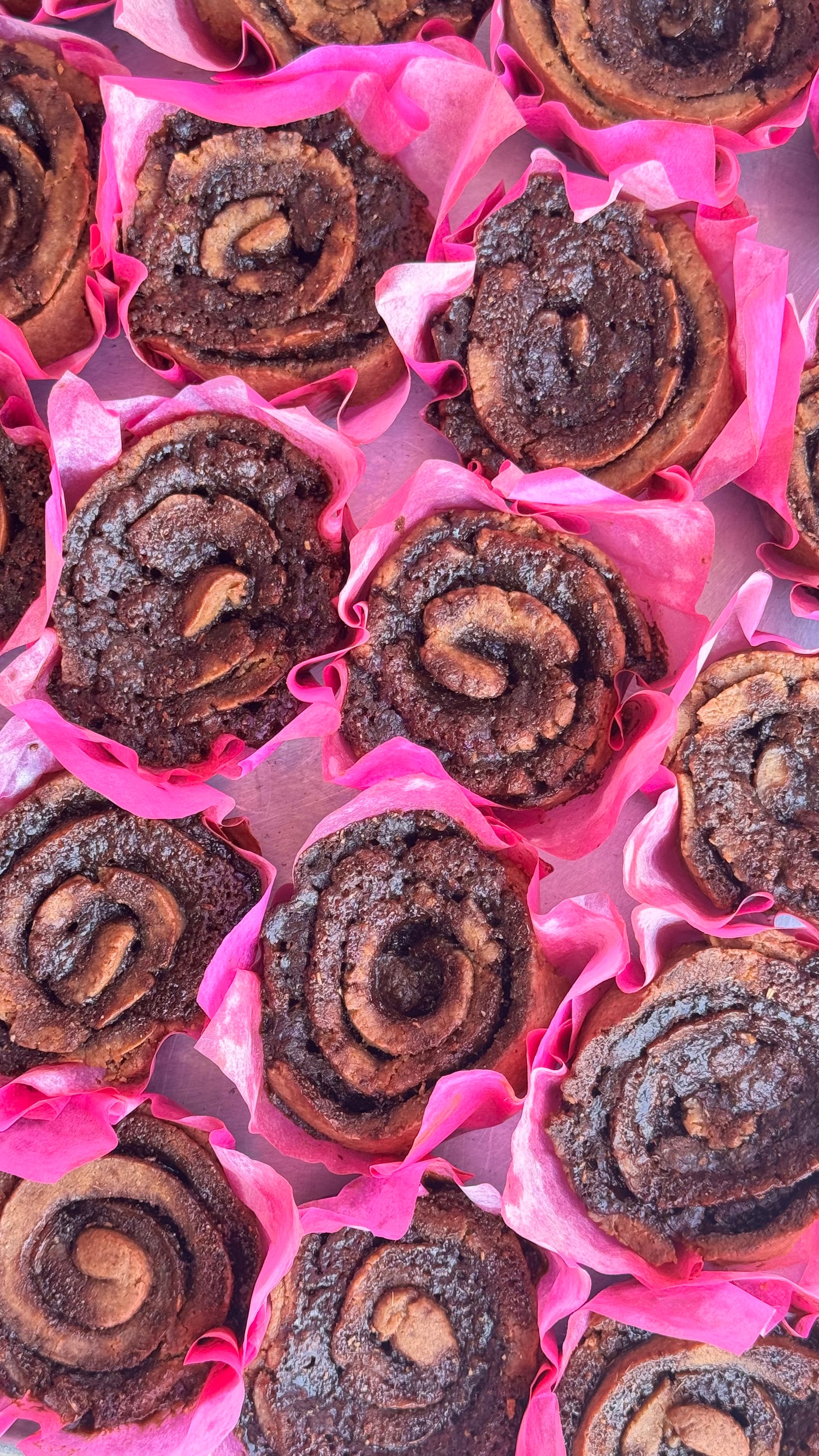cardamom swirl buns in pink packaging